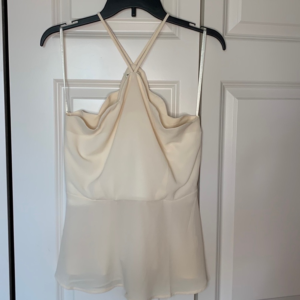 A cream shirt that’s lightweight and sheer